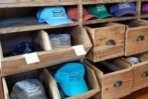 Shelf full of baseball hats