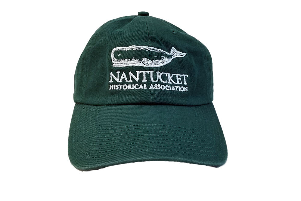 Green baseball hat with whale and NHA logo. 